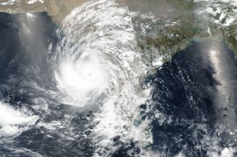 An image released by NASA shows the cyclone approaching western India.