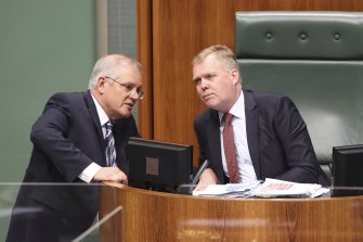 Prime Minister Scott Morrison in discussion with Speaker Tony Smith.