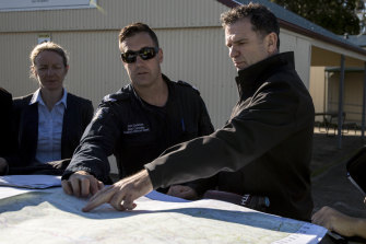 Detective Inspector Andrew Stamper (right) of the missing persons squad.