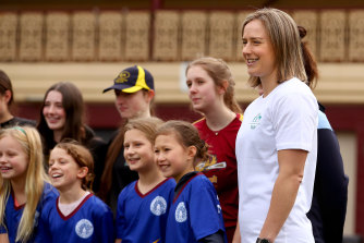 Ellyse Perry with young cricketers at Friday’s announcement of the Australian women’s squad for the Commonwealth Games in Birmingham.