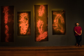 Clinton Naina beside Stolen Climate.