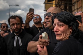 Simona Tomasova sister of Stanislav Tomas speaks to a crowd during a commemorative event of the death of her brother in Teplice, Czech Republic. 