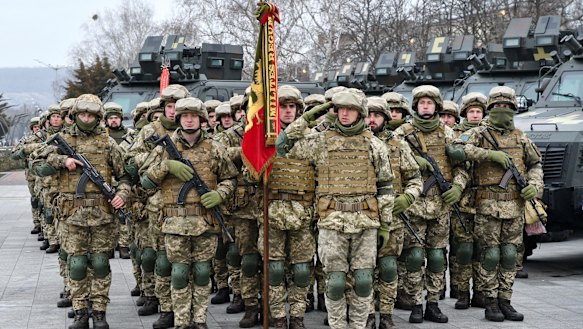 Ukrainian servicemen stand during the rehearsal of the parade for the Day of the Armed Forces of Ukraine in Kramatorsk, Ukraine. 