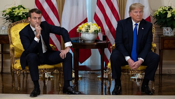 Donald Trump with French President Emmanuel Macron during their awkward press conference.