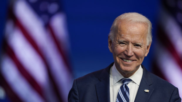 President-elect Joe Biden smiles as he speaks at The Queen theatre in Wilmington, Delaware. 