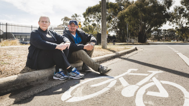 Philippa Horner and Southside market manager Wayne Skein sit next to where people are being fined. There has been a recent "spike" in infringements being issued. 