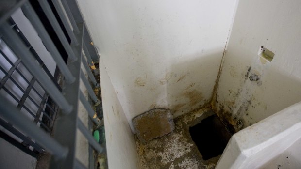 The jail cell shower area where drug lord  El Chapo slipped into a tunnel to escape from the Mexican Altiplano maximum security prison in 2015.