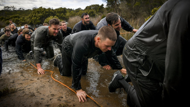 Victorian cricketers get down and dirty during the intense camp.