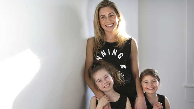 Pilates teacher Kirsten King with her daughters Charlie (left) and Willow in matching Running Bare outfits.