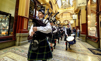 Lead on: Scotch College Pipes and Drums Band members in Block Arcade to launch the inaugural Melbourne Tartan Festival