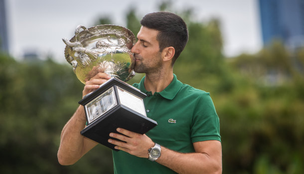 Novak Djokovic celebrates his 10th Australian Open title.
