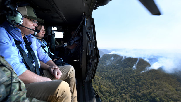 Mr Morrison and wife Jenny are flown over the Gold Coast hinterland.