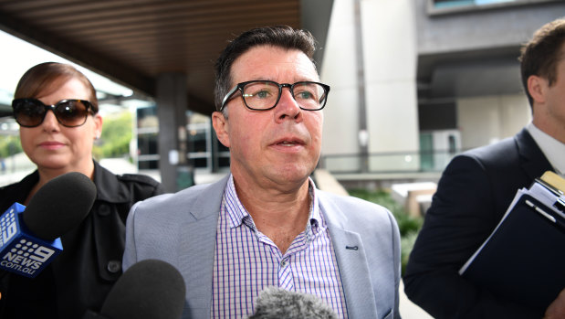 Suspended Ipswich mayor Andrew Antoniolli and his wife Karina leave the Magistrates Court in Brisbane.