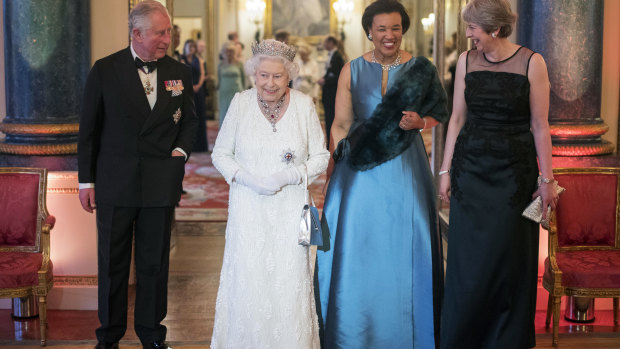 Baroness Scotland with Prince Charles, the Queen and then British prime minister Theresa May.