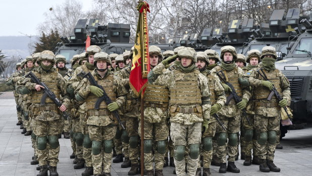Ukrainian servicemen stand during the rehearsal of the parade for the Day of the Armed Forces of Ukraine in Kramatorsk, Ukraine. 
