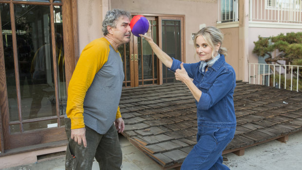 Don't play ball in the house: Christopher Knight (Peter) and Maureen McCormick (Marcia) during the Brady house renovation.