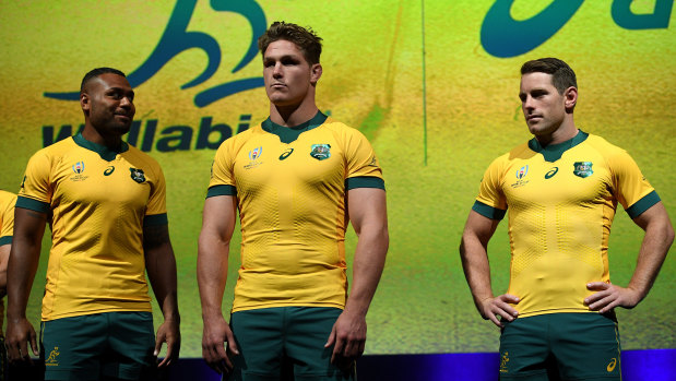 Wallabies Samu Kerevi, Michael Hooper and Bernard Foley at the launch of the official World Cup jersey in Sydney in May. 