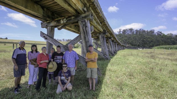Peter Dreverman (far right), a third-generation Orbost farmer, is among those campaigning to save and restore the bridge.