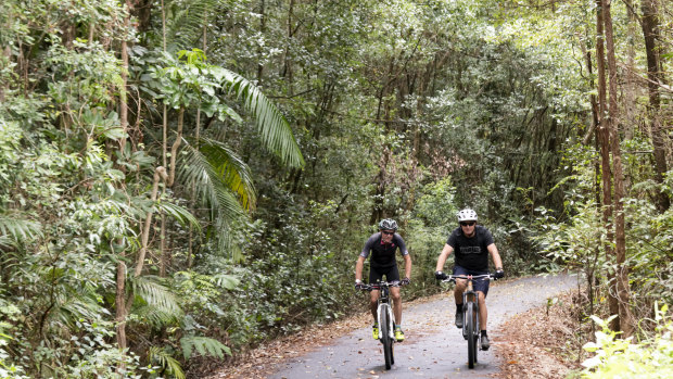 Cyclists enjoy the Tweed section of the Northern Rivers Rail Trail.