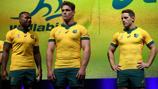 No sign of Izzy: Wallabies Samu Kerevi, left, Michael Hooper and Bernard Foley at the launch of the official World Cup jersey in Sydney on Wednesday.