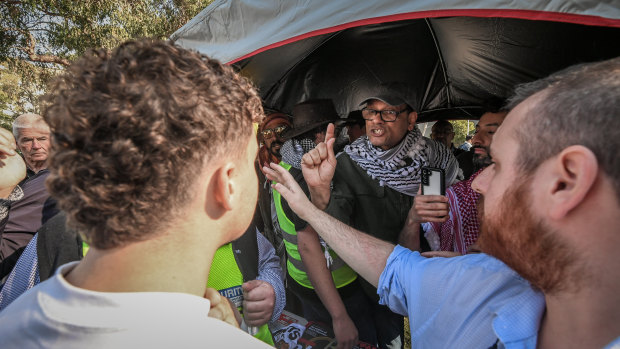 Palestinian and Israeli supporters confront each other at Monash University on Wednesday.