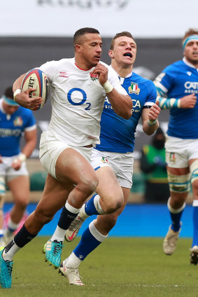 Anthony Watson of England breaks clear to score their fourth try during the Guinness Six Nations match between England and Italy.
