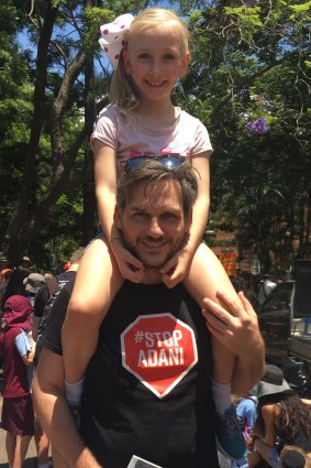 Greens MP Michael Berkman attended the protest with his daughter Bonnie. 