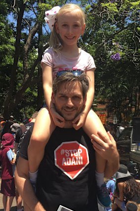 Greens MP Michael Berkman attended the protest with his daughter Bonnie. 