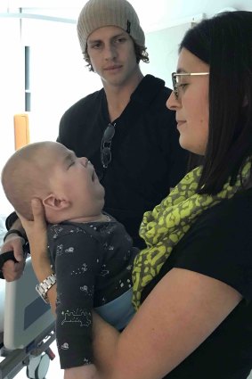 Mrs Goodwin with Winston meeting Nathan Fyfe in hospital. 