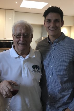 Collingwood great Murray Weideman with his grandson, Melbourne player Sam.