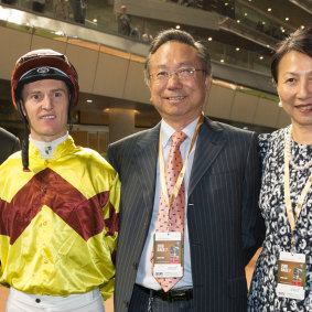 Racehorse owner Boniface Ho with jockey Zac Purton at the Dubai World Cup in 2019.