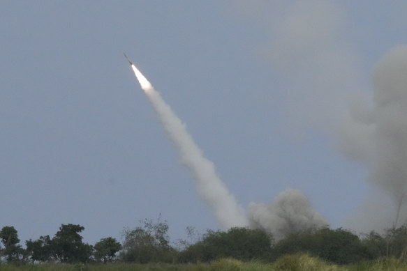 The US high mobility artillery rocket system fires a missile at the ship as part of a barrage of high-precision rockets, airstrikes and artillery fired in Philippine waters facing the disputed South China Sea. 