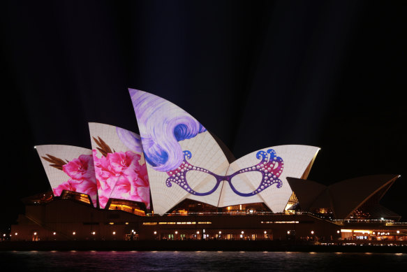 The Sydney Opera House sails are seen illuminated in honour of Barry Humphries following his state memorial service at Sydney Opera House on December 15.