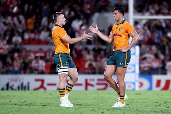 Isaac Henry and Joseph-Aukuso Suaalii celebrate a tough win.
