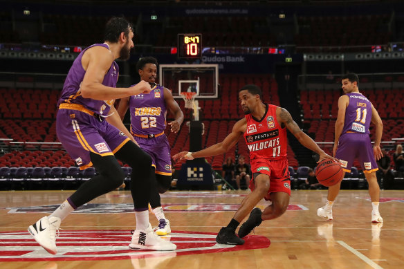 Bryce Cotton (right) continued to run rampant against the Sydney Kings on Sunday.