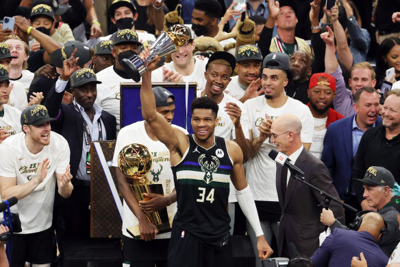 Giannis Antetokounmpo celebrates the Bucks’ NBA finals win.