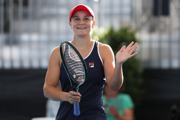 Ashleigh Barty is all smiles after winning her first WTA title on home soil with victory in the Adelaide International on Saturday.