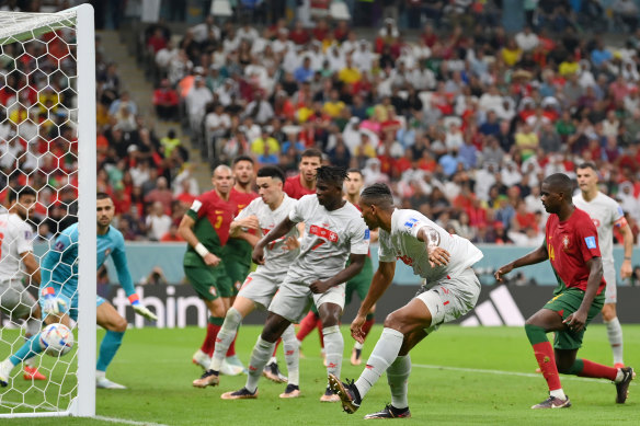 Manuel Akanji pulls one back for the Swiss.