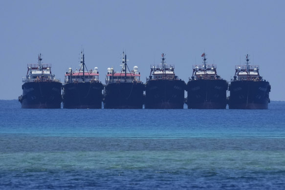 Some of the many suspected Chinese militia ships lay side by side on April 22 at the Philippine-claimed Whitsun Reef.