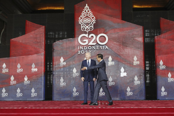 G20 host Indonesian President Joko Widodo seems to be guiding US President Joe Biden to exit stage right during the summit in Bali.