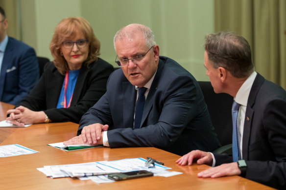 RACGP president Dr Karen Price, Prime Minister Scott Morrison and Health Minister Greg Hunt, pictured at the GP roundtable on Friday.