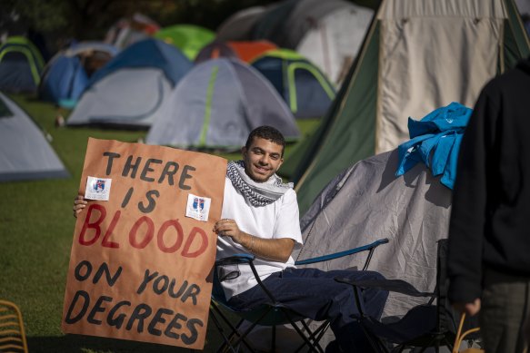 Fourth-year design student Khalid Abbas, 21, takes part in the pro-Palestine encampment at the University of Melbourne.
