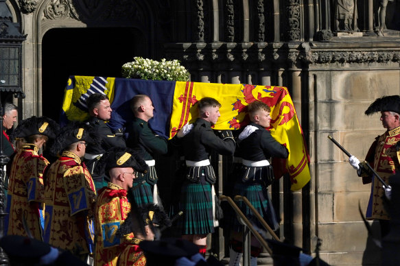 Queen Elizabeth II’s coffin is carried from St Giles Cathedral for its journey to London.