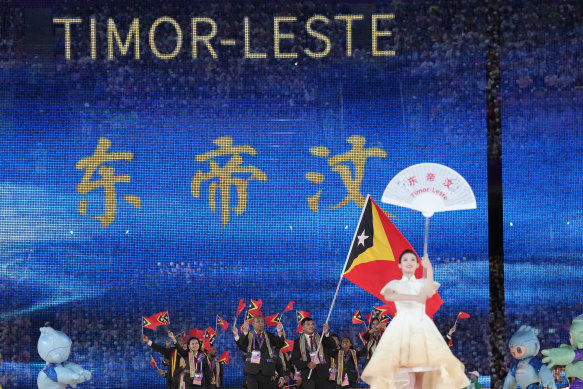 Timor-Leste athletes and team officials arrive during the opening ceremony of the 19th Asian Games in Hangzhou, China, on September 23.