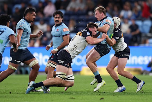 Harry Potter getting tackled against the Brumbies.