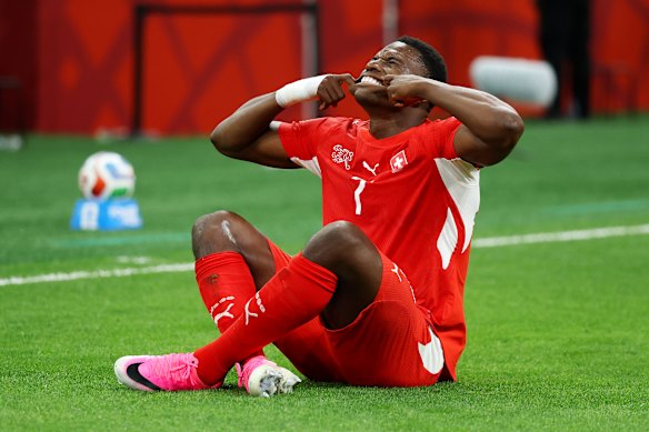 Breel Embolo #7 of Switzerland celebrates scoring.