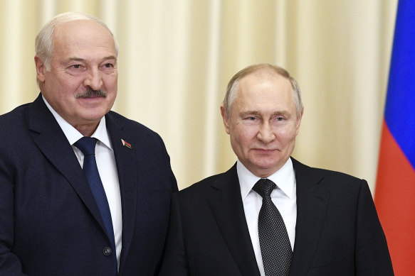 Russian President Vladimir Putin (right) and Belarusian President Alexander Lukashenko pose for a photo before their talks at the Novo-Ogaryovo state residence, outside Moscow, on February 17.