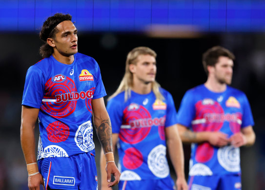 Jamarra Ugle-Hagan (left) during warm-ups for Saturday night’s match.