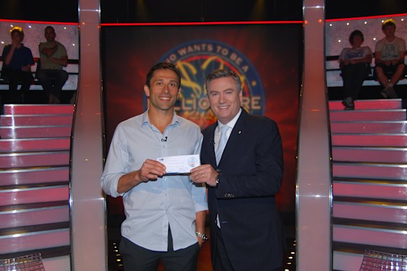 With Eddie McGuire after Brandi won $50,000 on Millionaire Hot Seat in 2010 – enabling him to study writing.