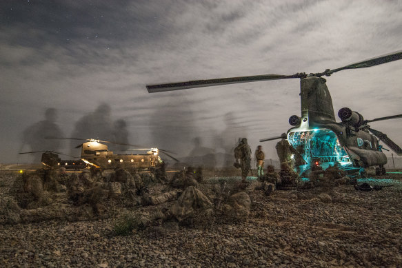 Australian Army soldiers from Special Operations Task Group prepare for a night-time operation in Oruzgan in 2008.